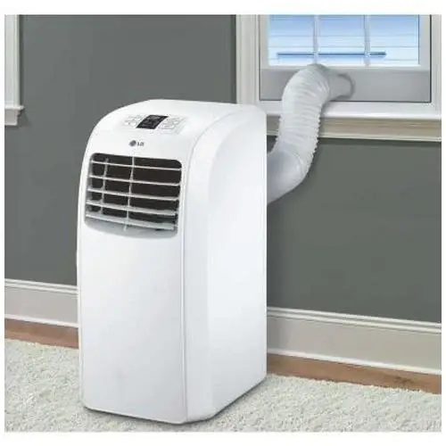 Best portable AC in India installed with short exhaust hose at a sliding window